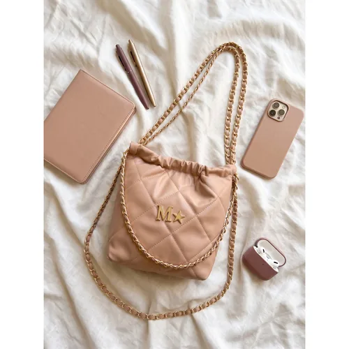 Bolsa Theia 22 Mini personalizada con letras metálicas